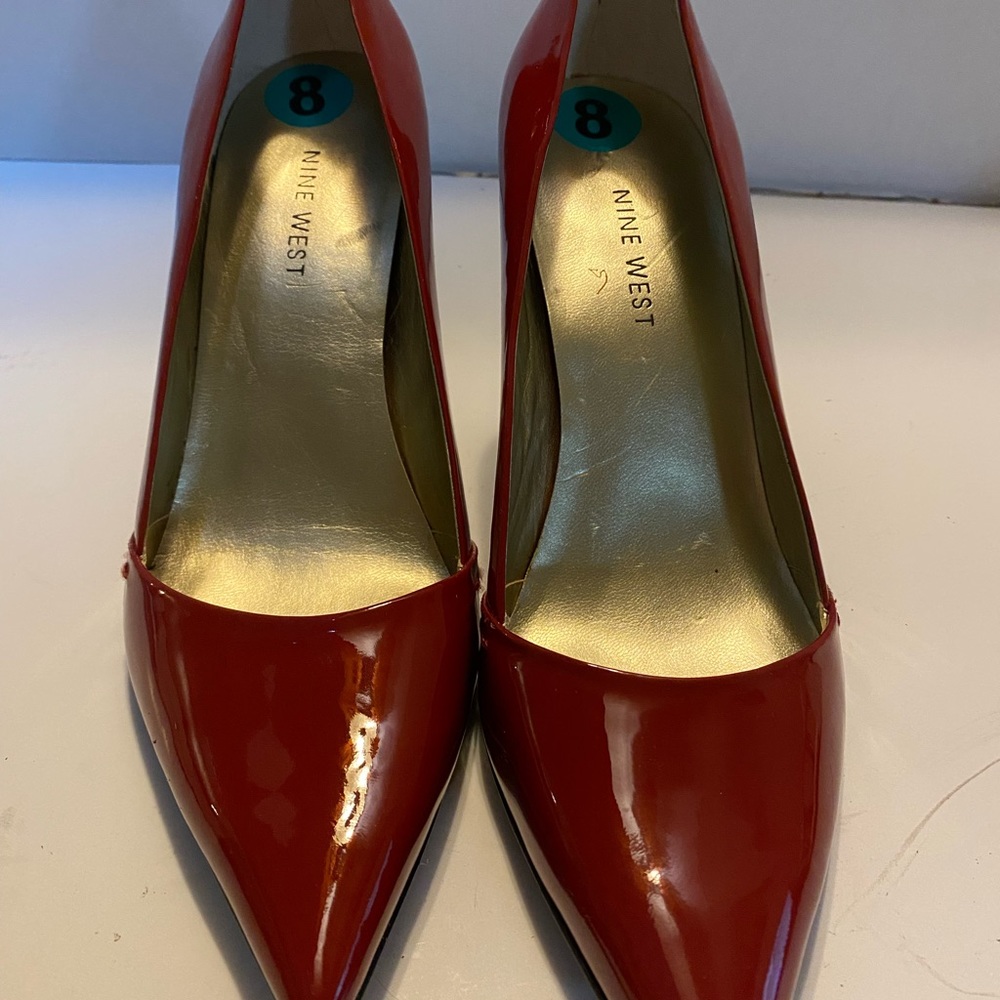Nine West red leather pumps. Size 8